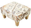 Half Classic in Harlequin Postelia Amber/Slate footstool with light wood feet 
