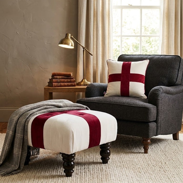 England flag cushion and footstool in home setting with grey chair