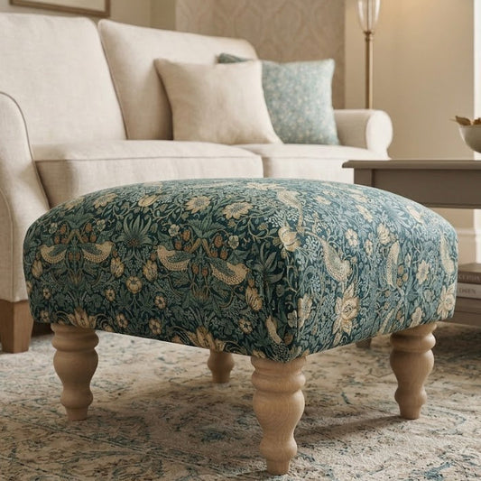 Decorative ottoman with floral pattern in a living room setting